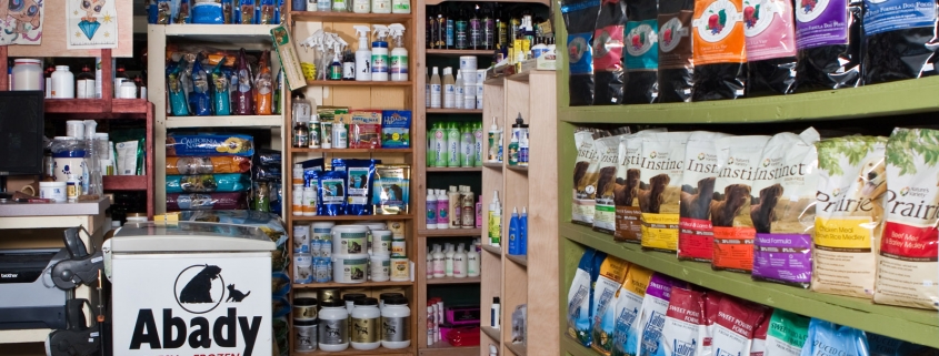 Shelves filled with pet food and supplies